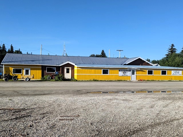 The Roadhouse is the yellow building in downtown McGrath, AK
